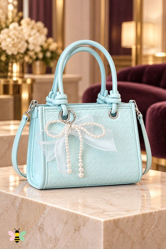 Arabella Pearl Bow Mini Bag — Pastel Blue — front view