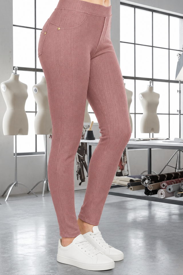 Magic Pant Desert Rose detail in the signature atelier setting, with white sneakers.