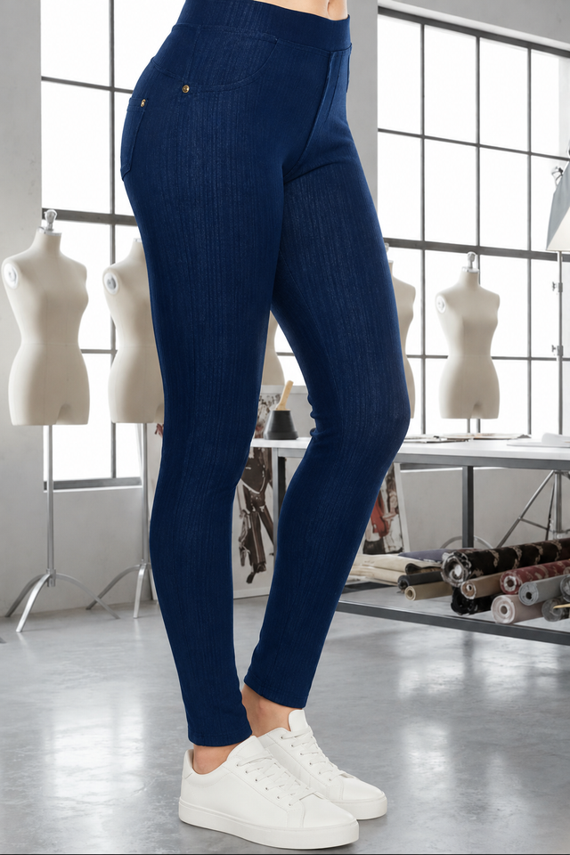 Magic Pant Cobalt Blue detail in the signature atelier setting, with white sneakers.